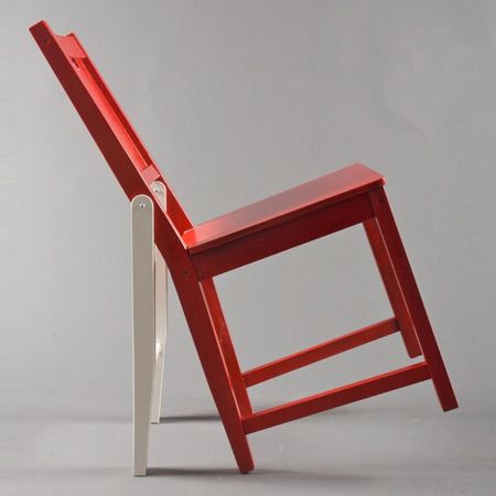 A chair designed in a similar way with legs on the back called Attitude Chair by Deger Cengiz